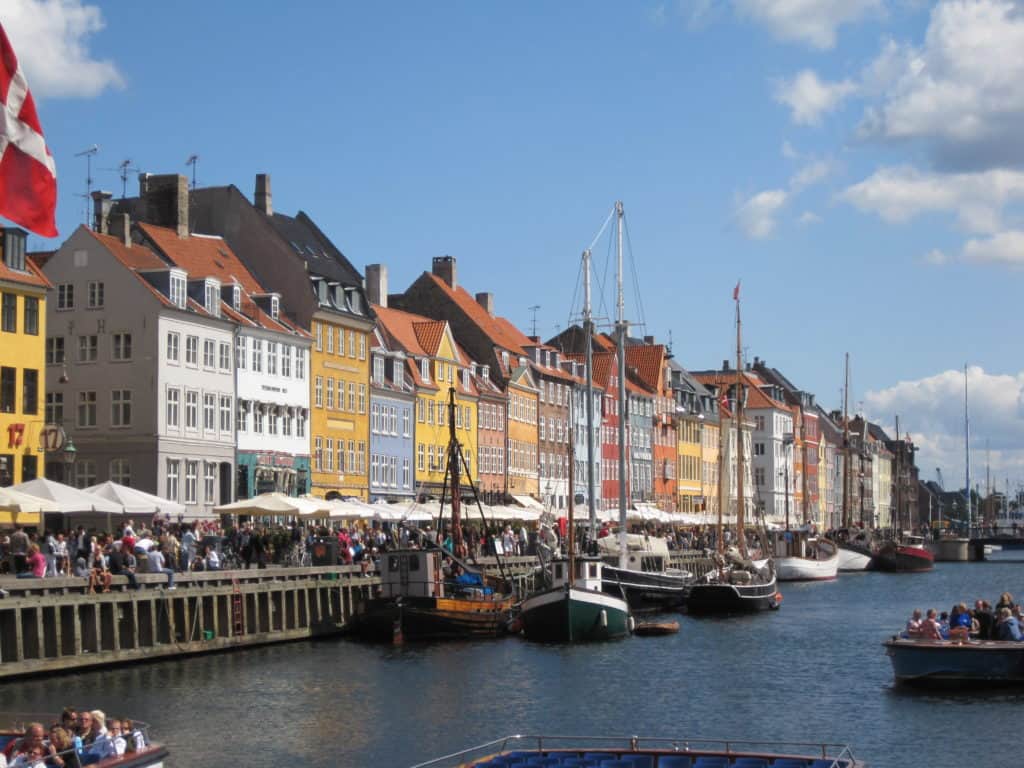Colourful buildings of Nyhavn in Copenhagen on a sunny day.