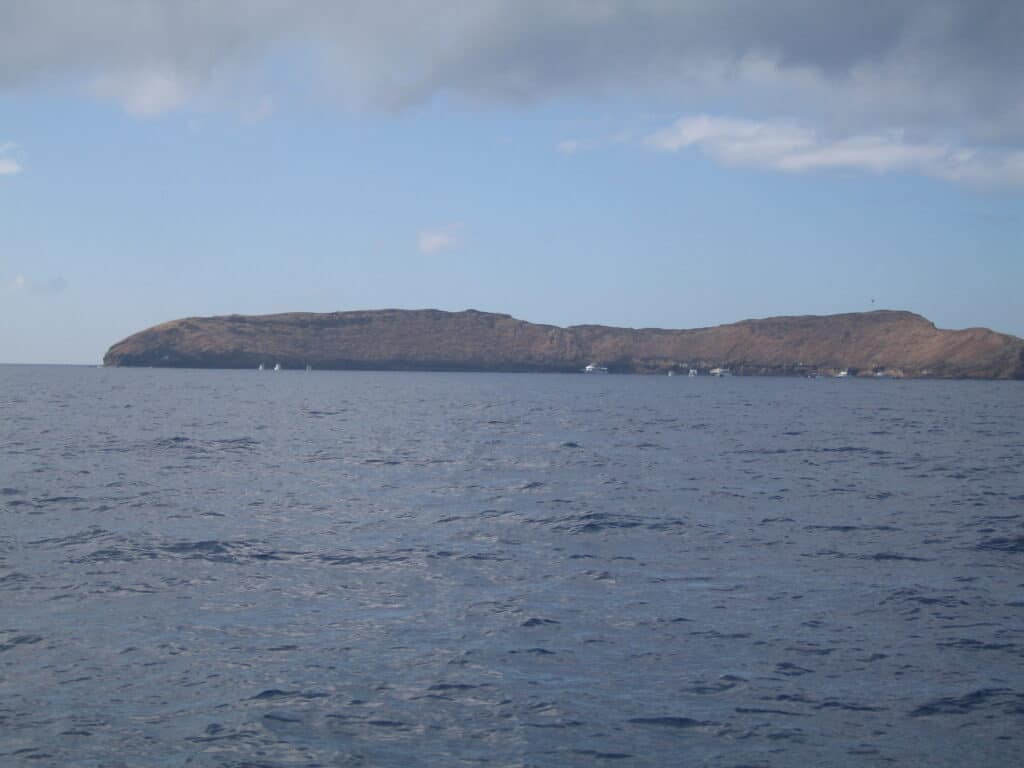 Approaching Molokini Crater by boat, Maui.