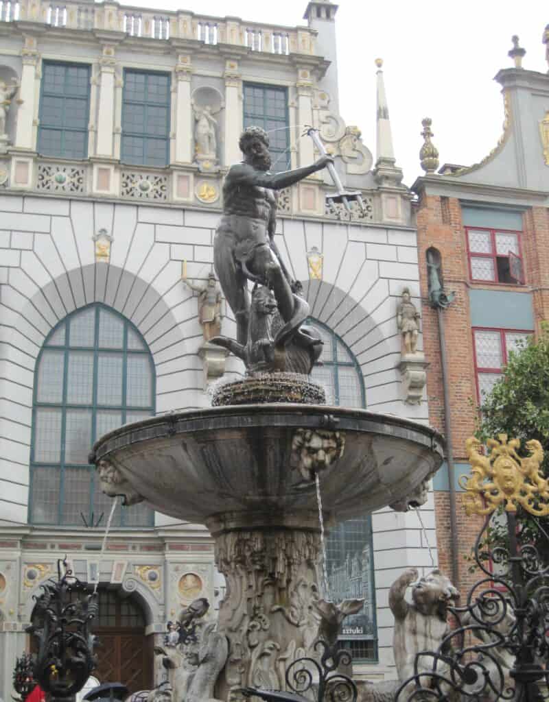 Neptune's Fountain in Gdansk, Poland on a rainy day.