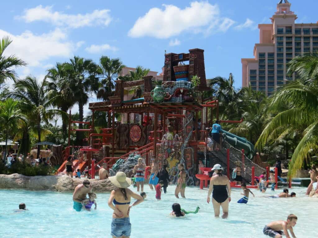 Parents and children enjoying Splashers water playground at Atlantis Bahamas.