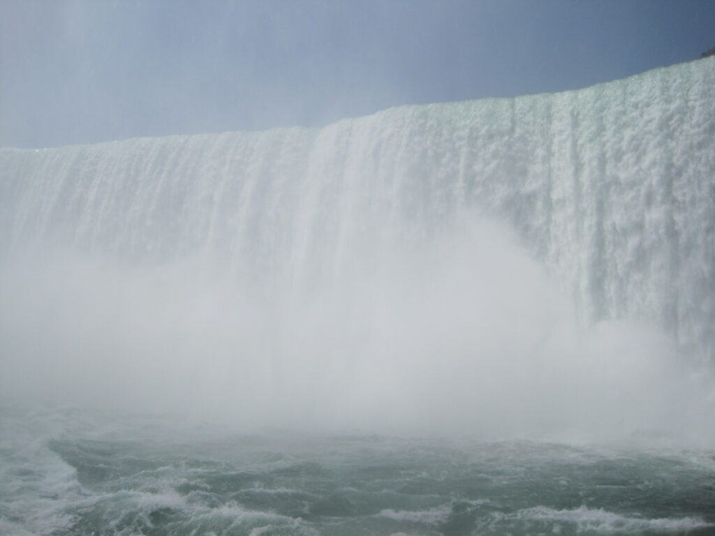 view of horseshoe falls from maid of mist in the basin - niagara falls, Canada.