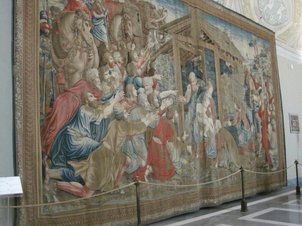 tapestry hanging on wall in vatican museums.