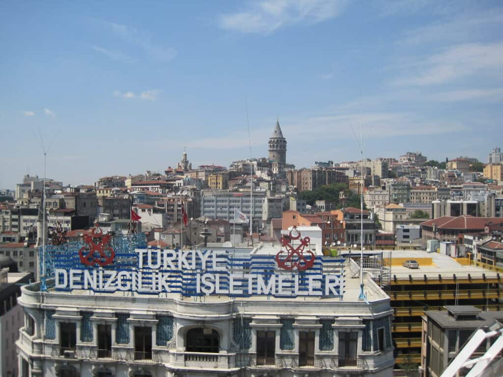 View from balcony of a cruise ship of buildings and Galata Tower in Istanbul, Turkey.