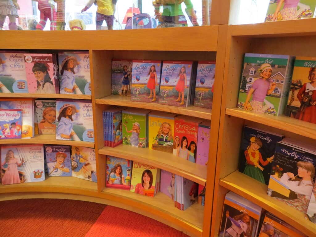 Shelves of books on display at American Girl Place.