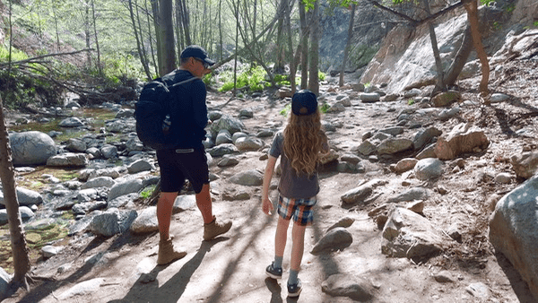 Man and young girl hiking in Eaton Canyon, Pasadena, California.