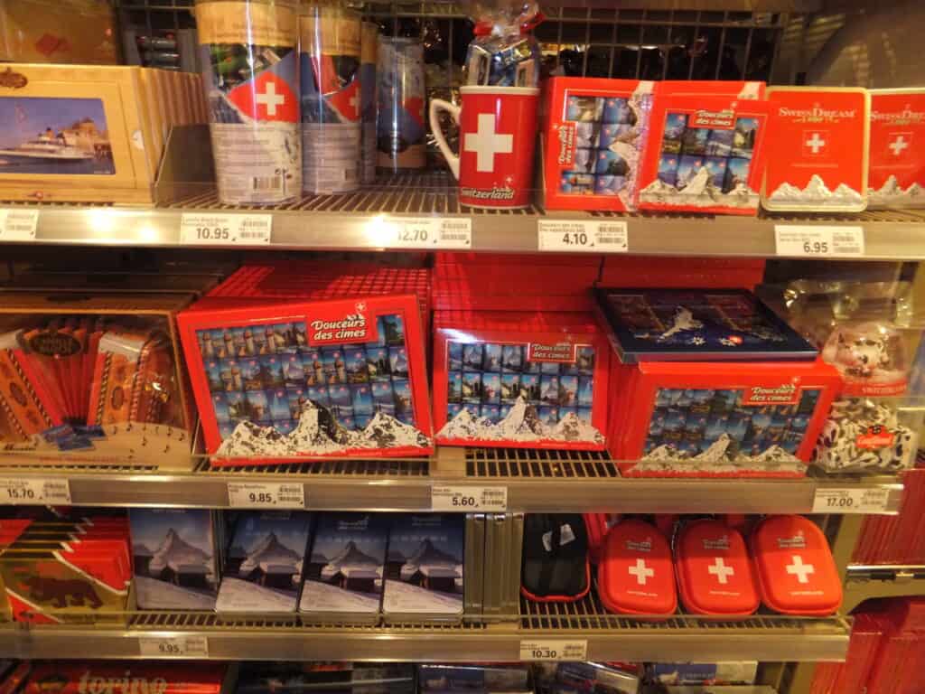 Shelf filled with Swiss chocolate in shop in Geneva.