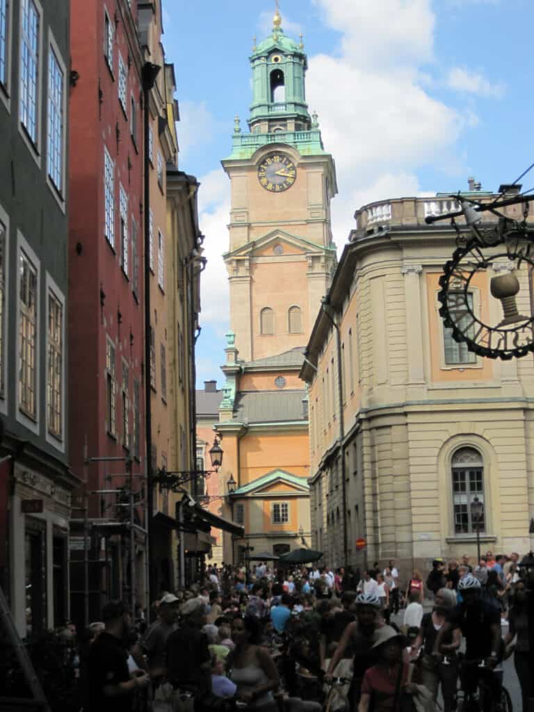 Crowded street in Gamla Stan, Stockholm on a summer day.