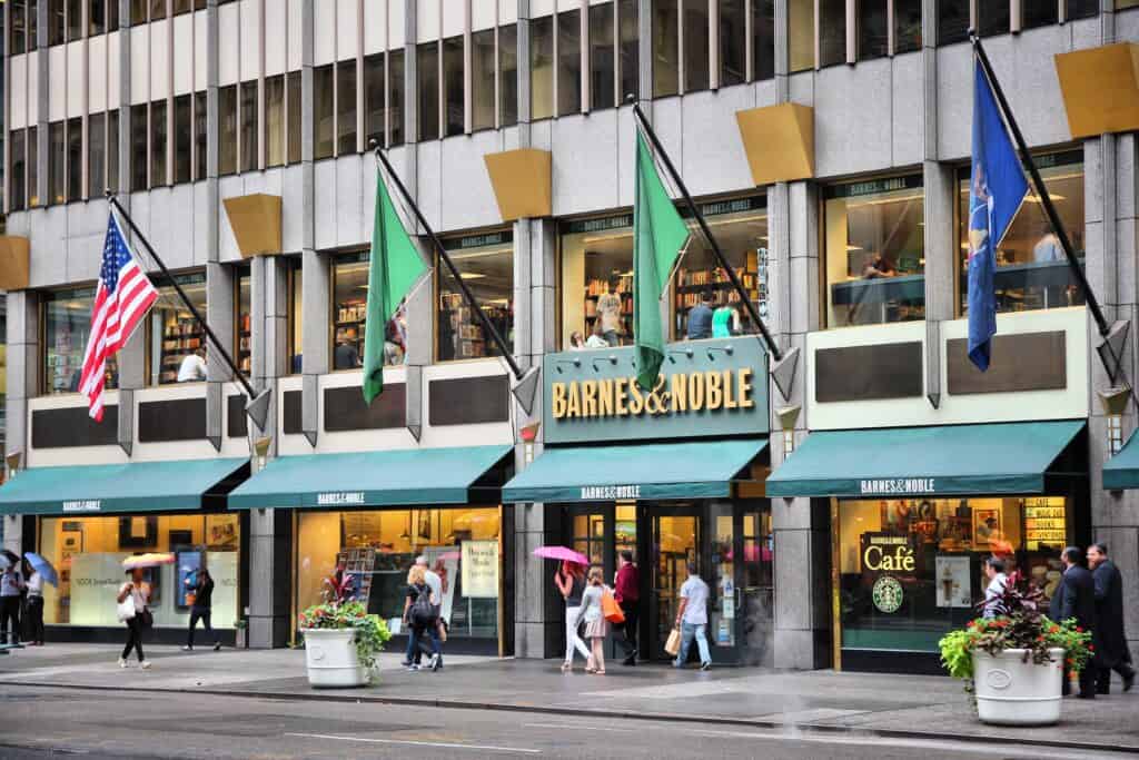 People walk past Barnes and Noble headquarters bookstore at 5th Avenue in New York.