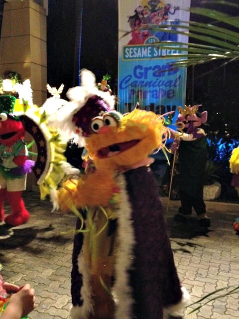 Zoe from Sesame Street wearing robe in Carnival night Parade at Beaches Negril, Jamaica.